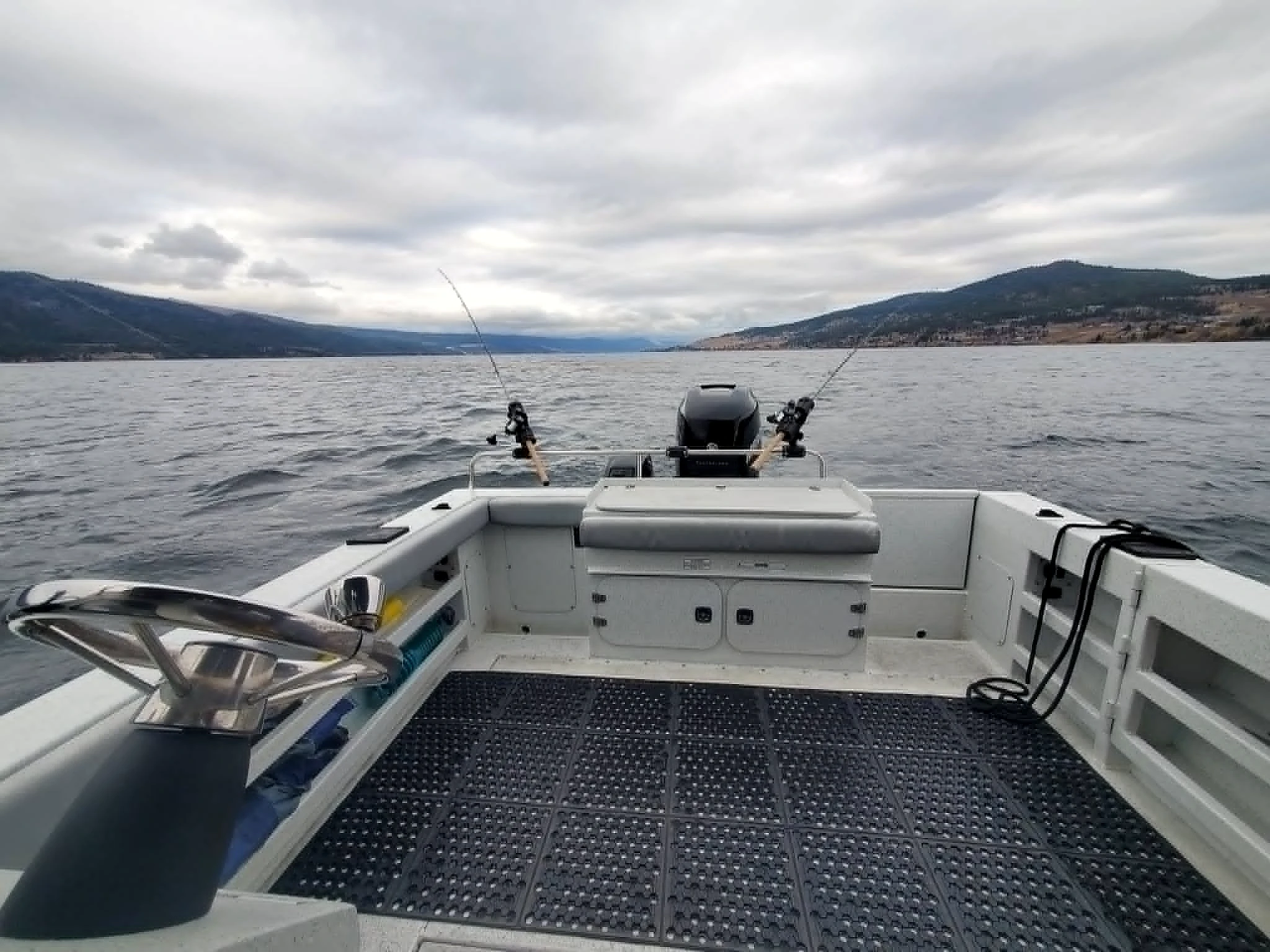Fishing rods trolling behind the Kingfisher on Okanagan Lake